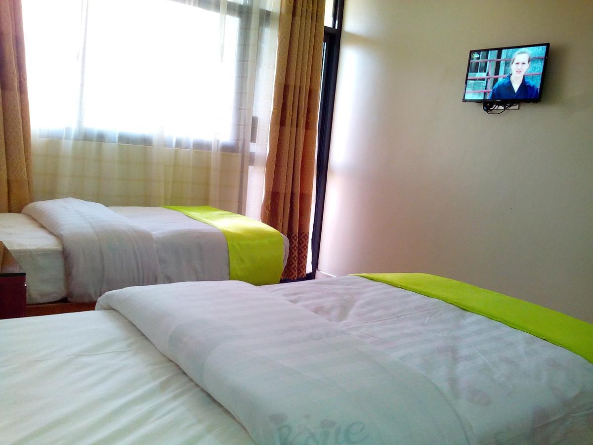 Hotel Ok Кампала Экстерьер фото
